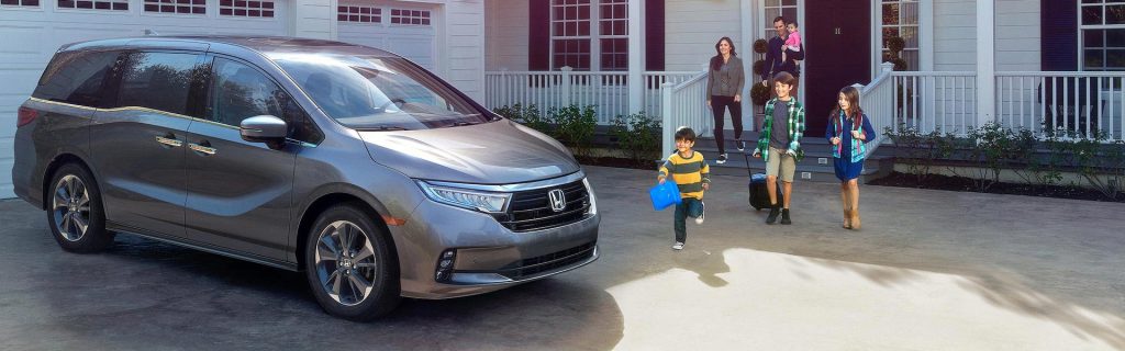 Family getting into Honda Odyssey | O'Daniel Honda Omaha, NE